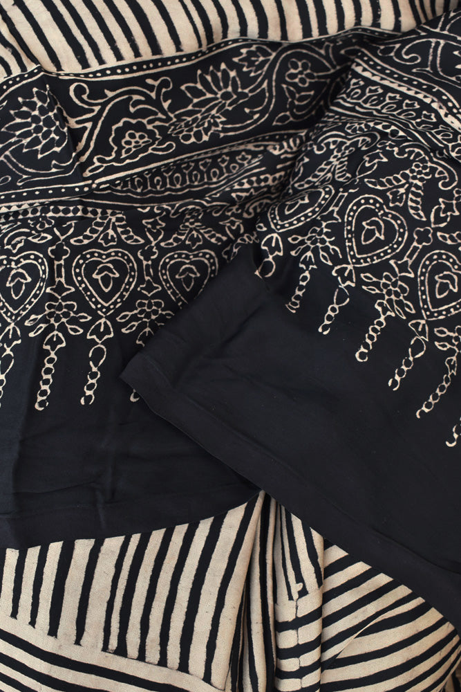 Elegant Hand Block Printed Ajrakh Modal Silk Saree with tassels