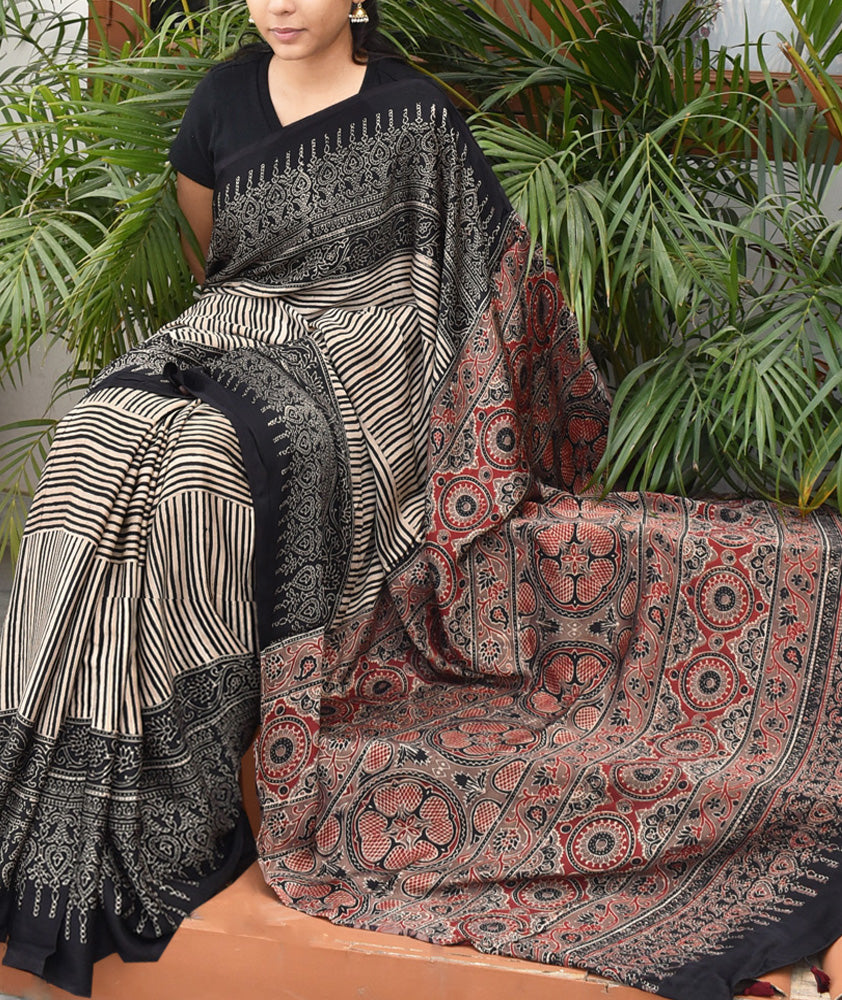 Elegant Hand Block Printed Ajrakh Modal Silk Saree with tassels