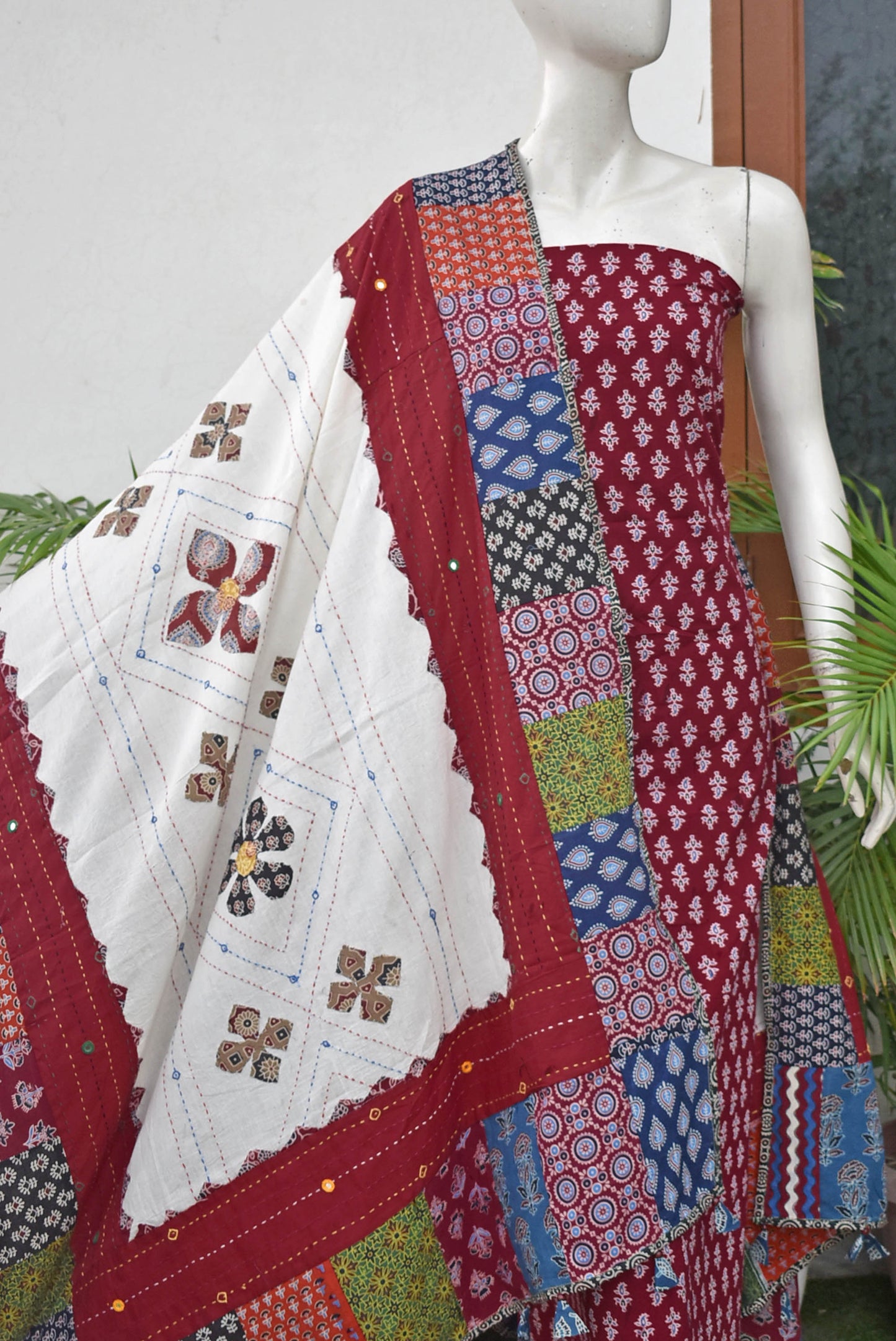Beautiful Ajrakh Cotton Unstitched Suit with Heavy Applique, Mirror, Kantha & Patch Work dupatta with Tassels