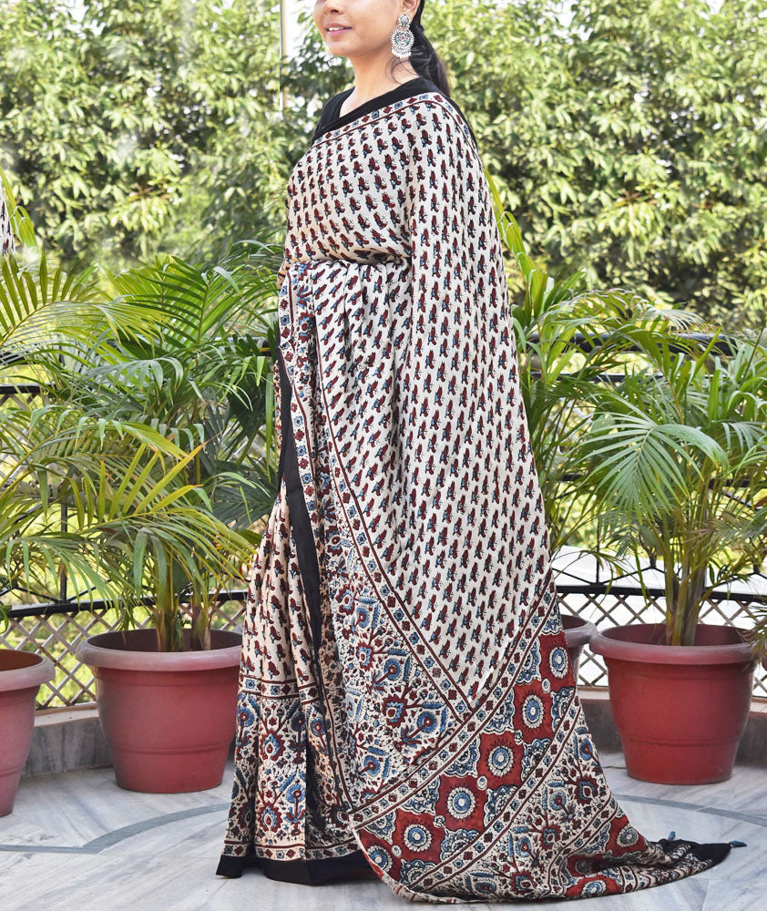 Elegant Hand Block Printed Ajrakh Modal Silk Saree with tassels