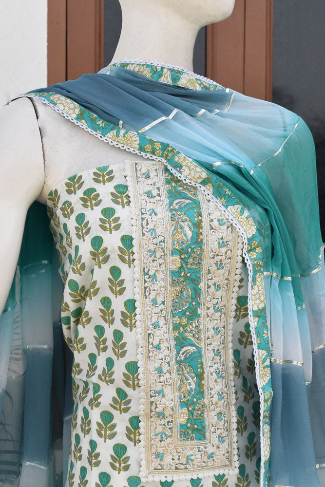 Beautiful Cotton Suit with Schiffli work Lace , Hand painted motifs & Hand Embroidery
