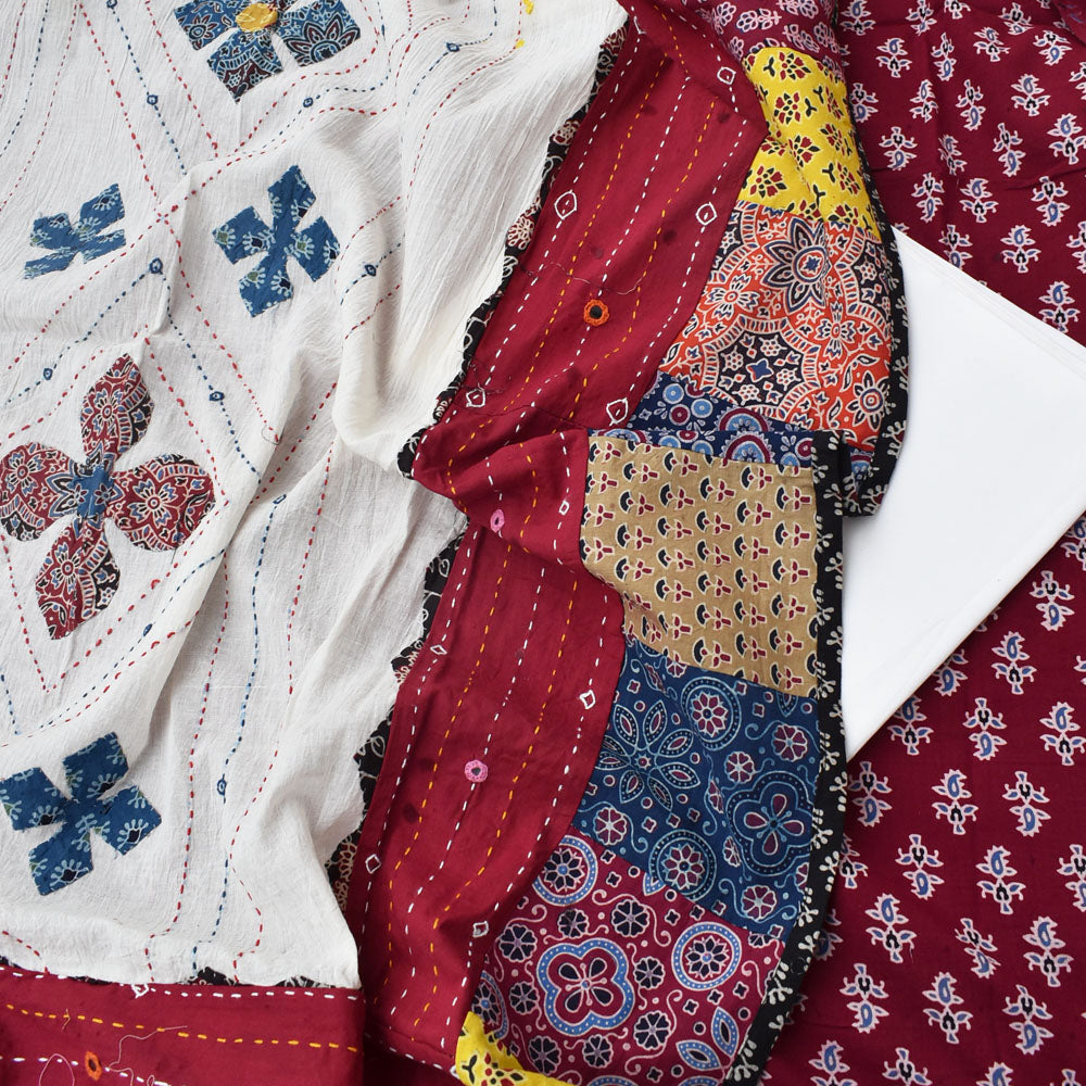 Beautiful Ajrakh Cotton Unstitched Suit with Heavy Applique, Mirror, Kantha & Patch Work dupatta with Tassels