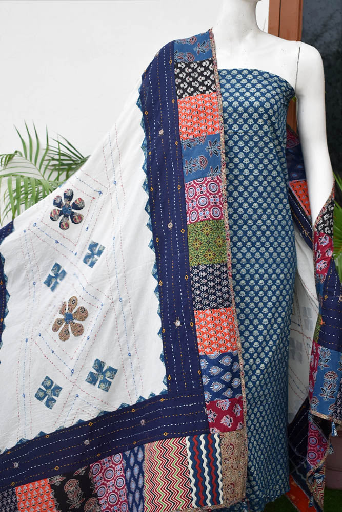 Beautiful Ajrakh Cotton Unstitched Suit with Heavy Applique, Mirror, Kantha & Patch Work dupatta with Tassels