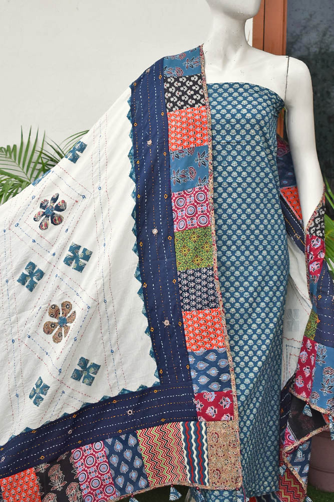 Beautiful Ajrakh Cotton Unstitched Suit with Heavy Applique, Mirror, Kantha & Patch Work dupatta with Tassels