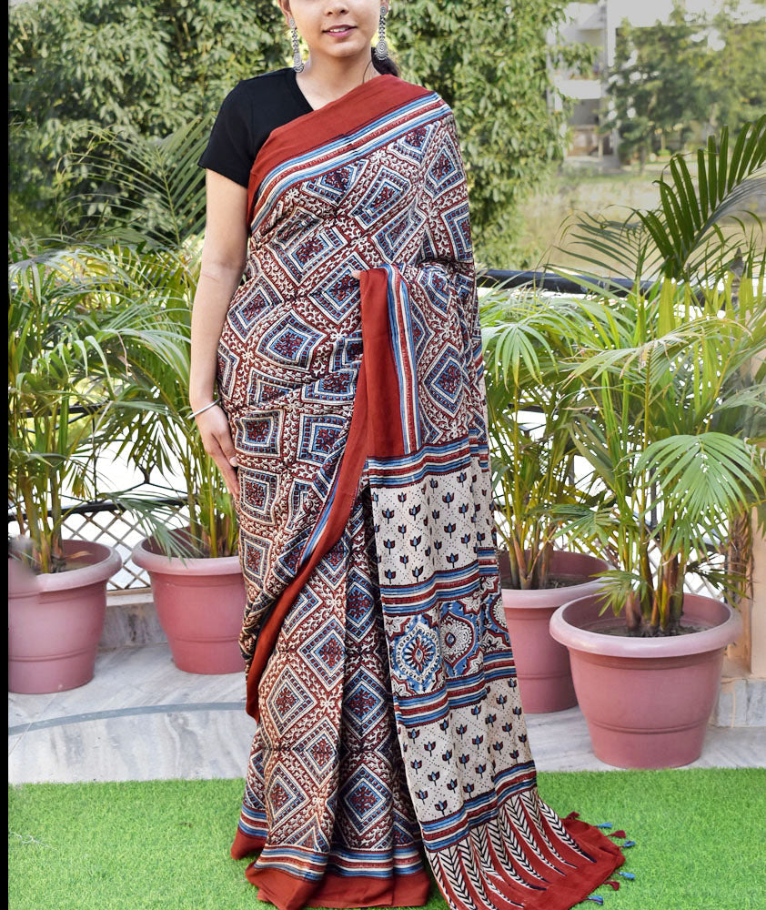 Elegant Hand Block Printed Ajrakh Modal Silk Saree with tassels