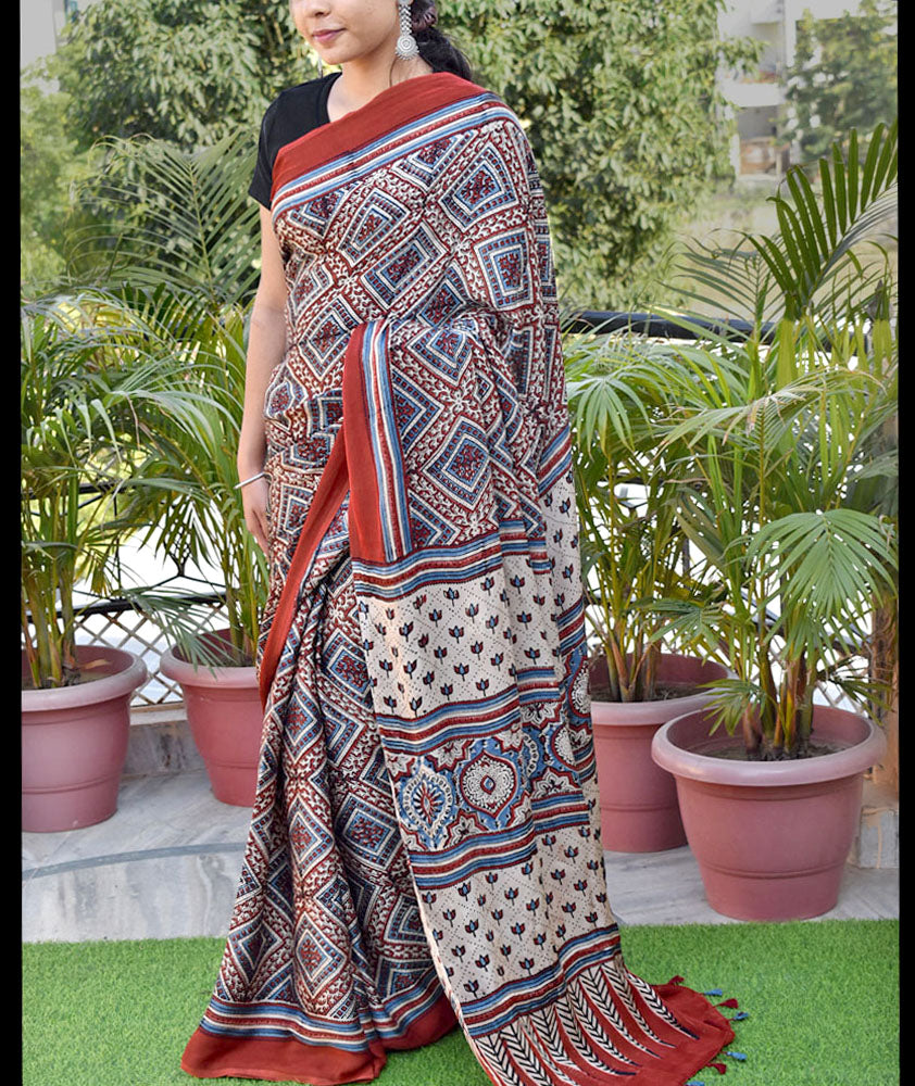 Elegant Hand Block Printed Ajrakh Modal Silk Saree with tassels