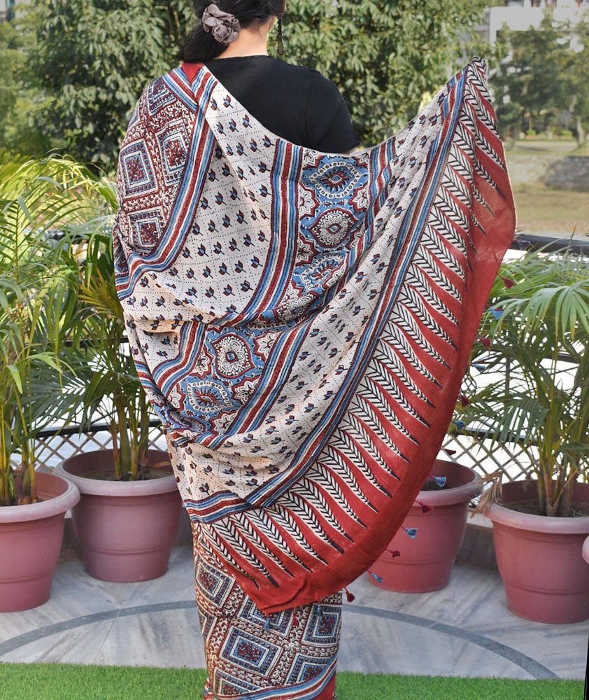 Elegant Hand Block Printed Ajrakh Modal Silk Saree with tassels