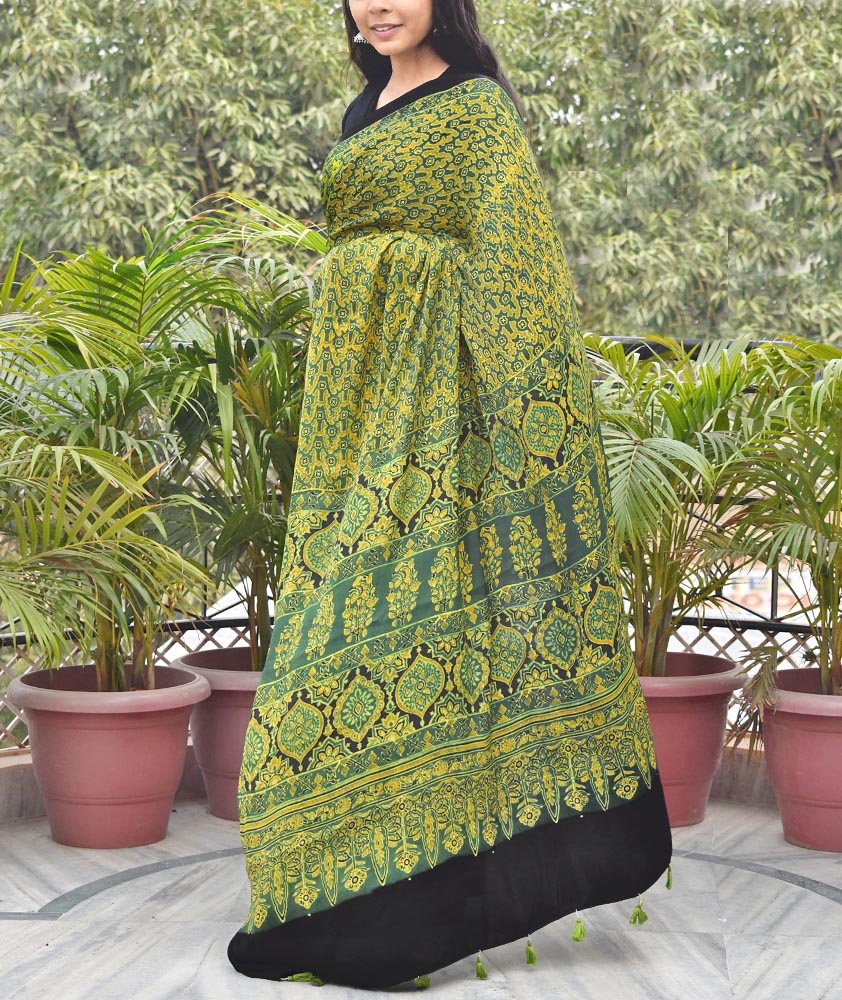 Elegant Hand Block Printed Ajrakh Modal Silk Saree with tassels