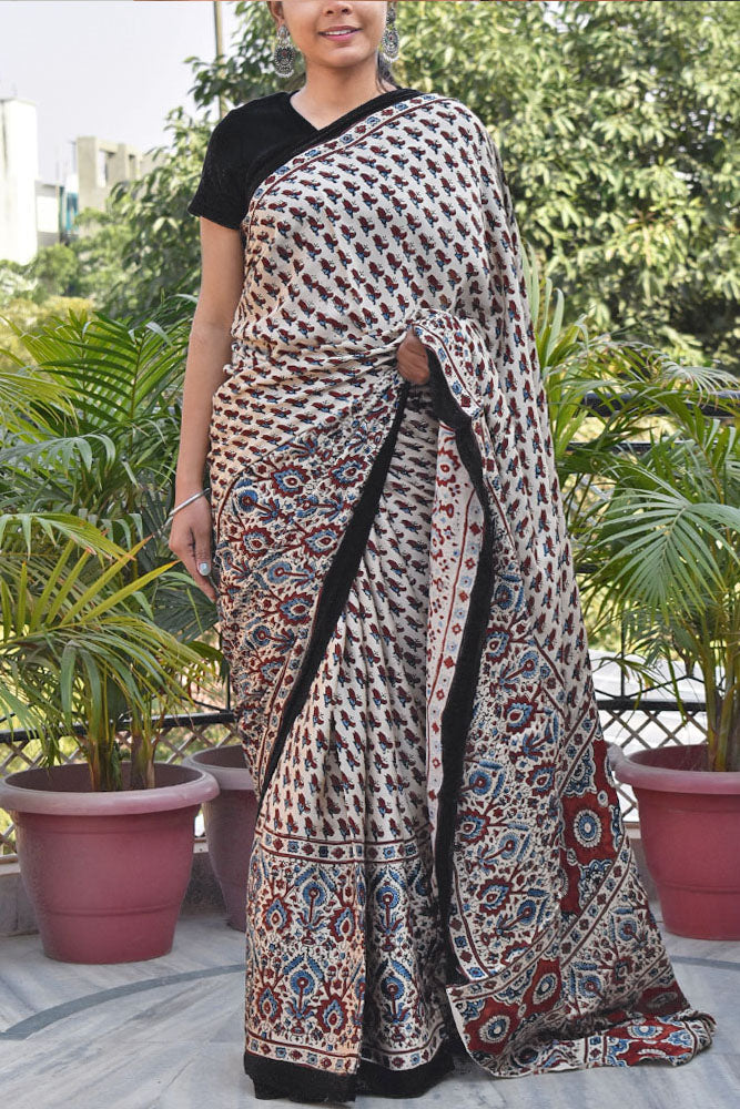 Elegant Hand Block Printed Ajrakh Modal Silk Saree with tassels