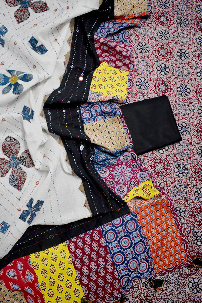 Beautiful Ajrakh Cotton Unstitched Suit with Heavy Applique, Mirror, Kantha & Patch Work dupatta with Tassels