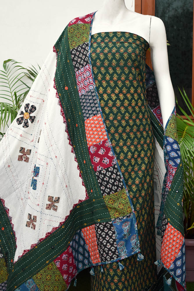 Beautiful Ajrakh Cotton Unstitched Suit with Heavy Applique, Mirror, Kantha & Patch Work dupatta with Tassels