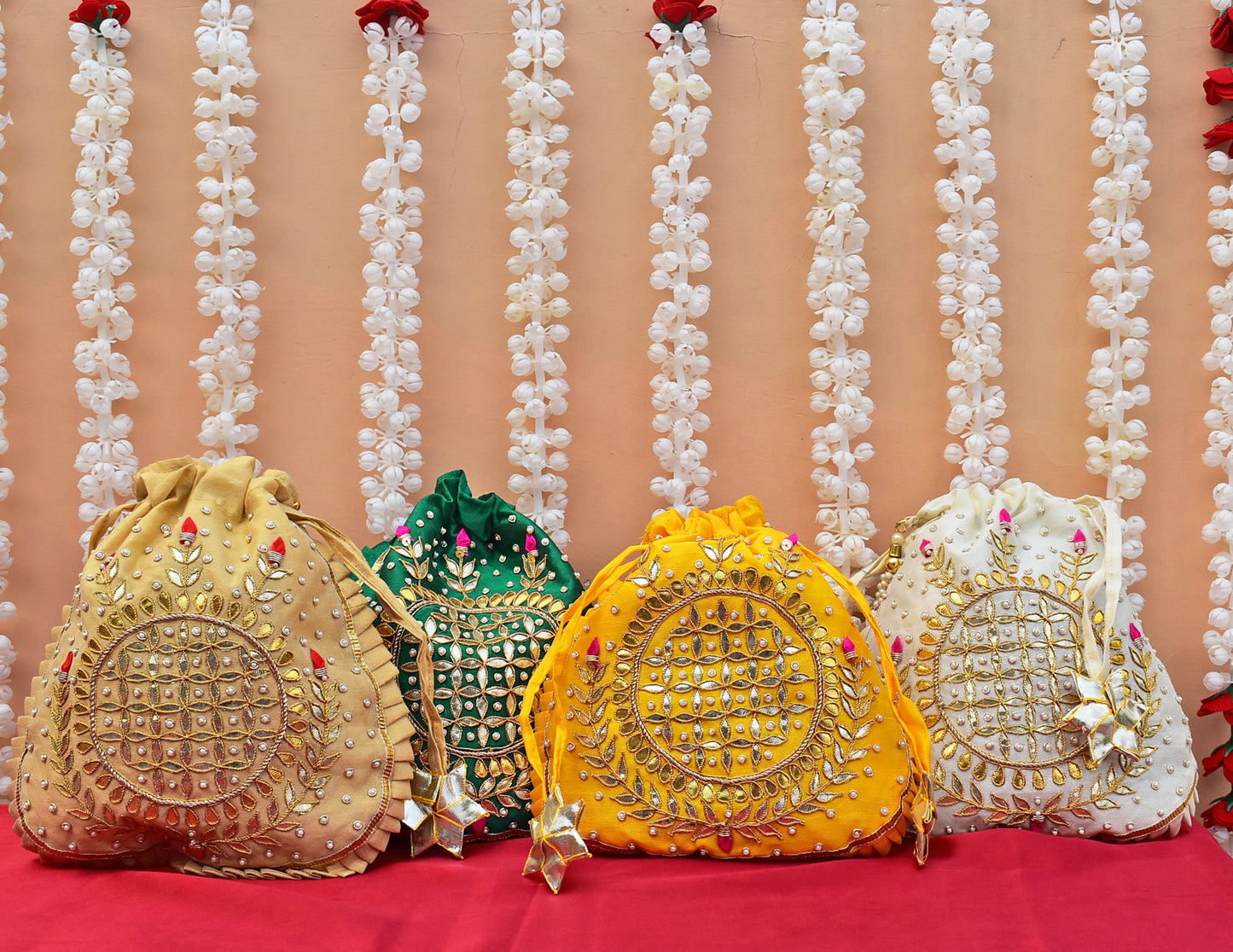 Set of 4 potlis - HAND GOTA PATTI & DABKA WORK SILK BLEND POTLI BAGS FOR GIVEAWAYS FOR WOMEN / RETURN GIFTS & FAVOURS FOR GUESTS
