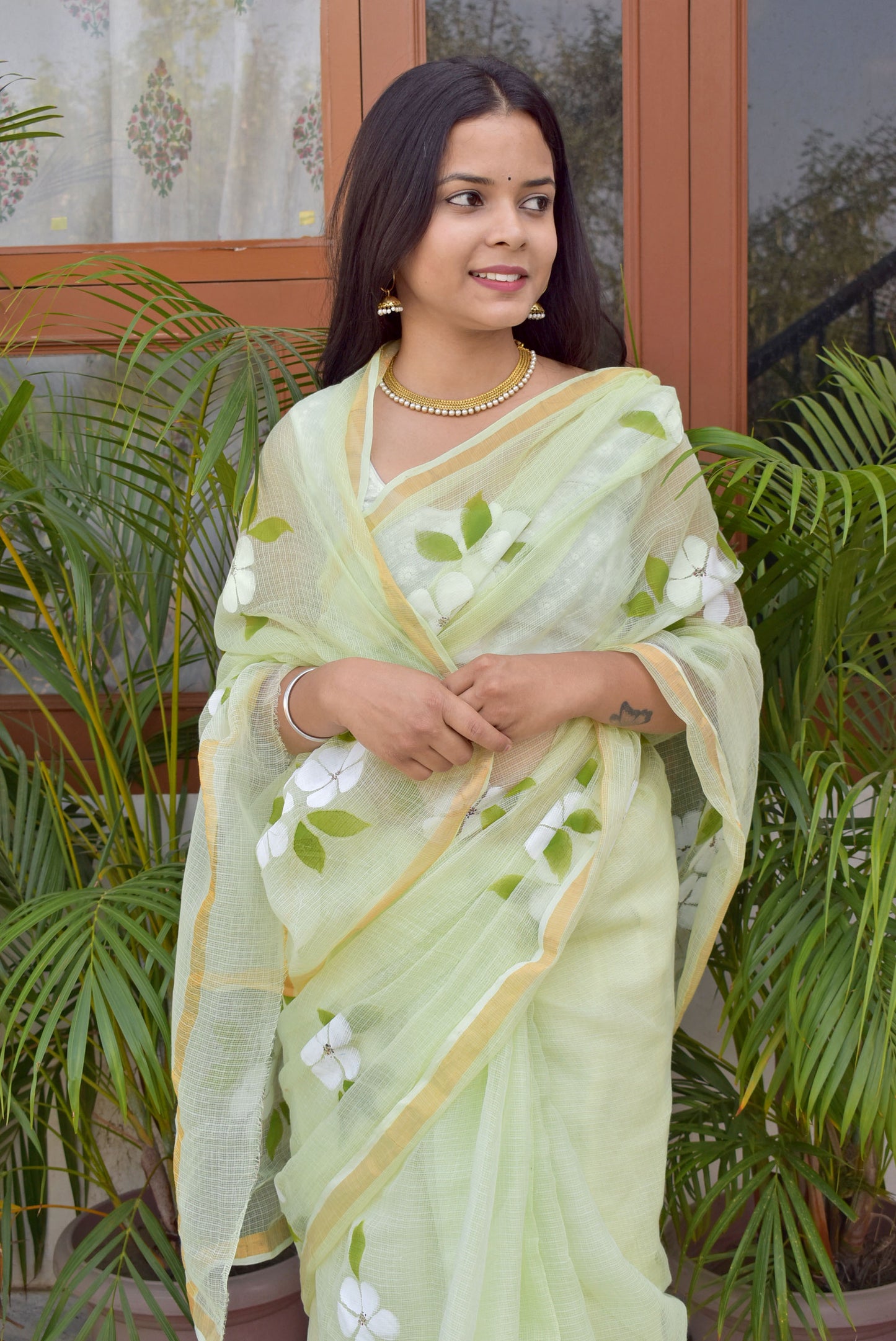 Prakriti : Beautiful Kota Doria Saree with Hand Painted Floral Motifs - Pista Green Color